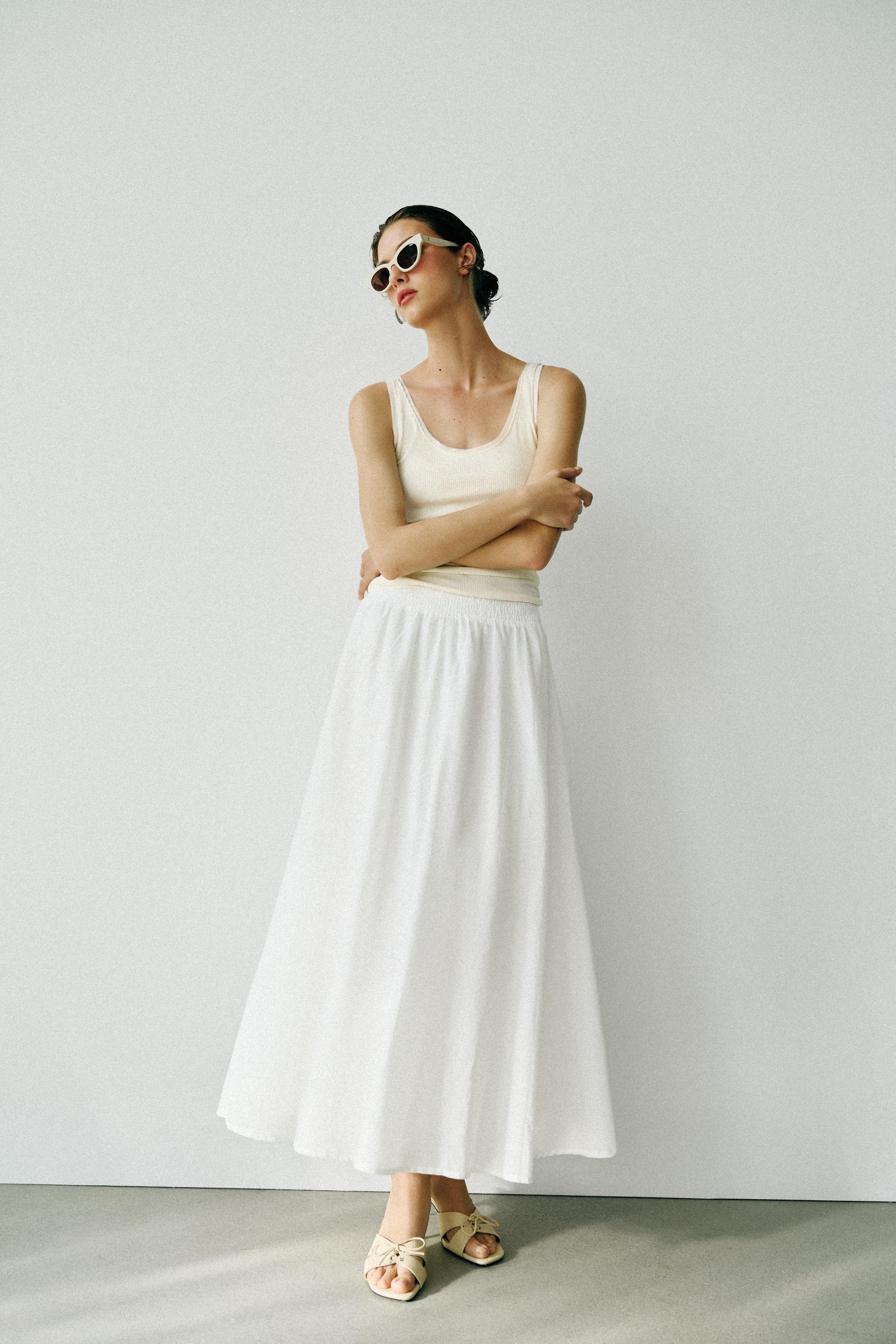 JUPE MI-LONGUE CAPE